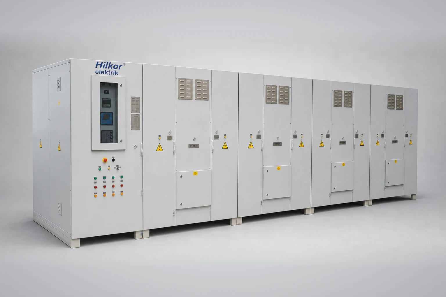 Metal-enclosed MV capacitor bank with control cubicle and four capacitor sections, angled view