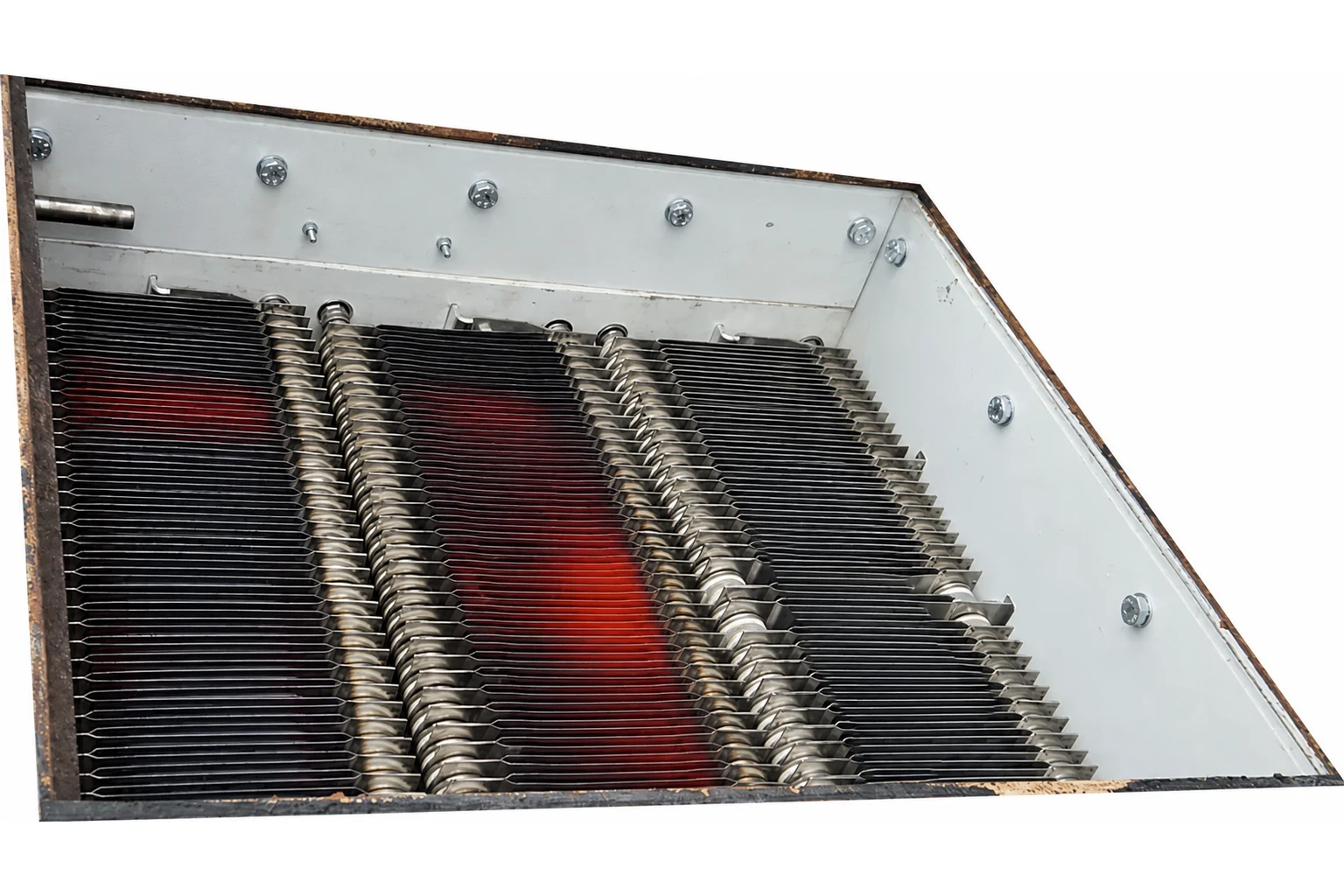 Open stainless-steel railway braking resistor grid glowing red-hot during dynamic braking operation